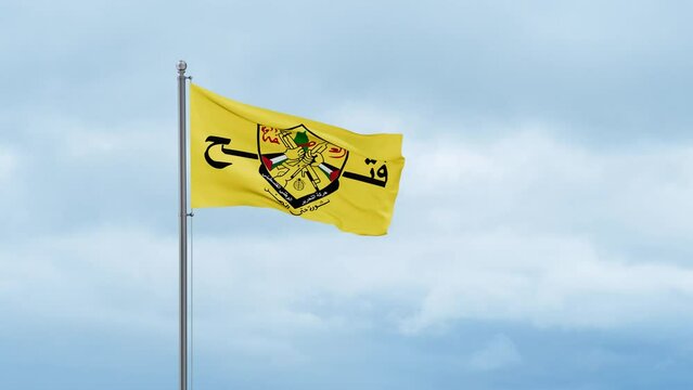 Fatah formerly the Palestinian National Liberation Movement flag waving in the wind