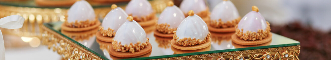 Delicious candy bar. Portion desserts at event. Close up. Banner for web site.