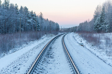 Snowy Frozen Railroad in a Winter Dusk