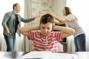A quarrel between parents in presence of upset child