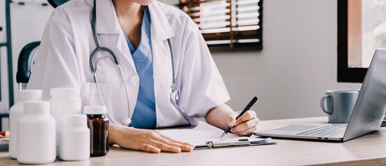 Medical technology concept. Doctor working with mobile phone and stethoscope in modern office