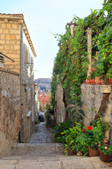 Historical narrow street with old houses in Dubrovnik, Croatia