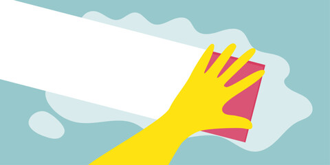 Hand in a yellow rubber glove with a pink cleaning sponge on a green background with a copy space