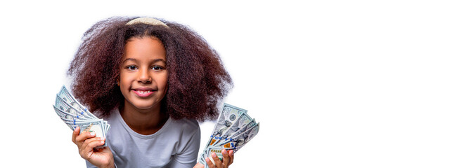 Smiling teenage kid girl holding hundreds of dollar money banknotes isolated white background. Portrait smile little african american girl, dollar banknotes. Children girl afro dollars 100