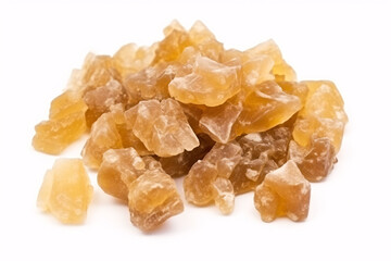 A combination of tropical benzoin and Dammar resins on a white backdrop is shown.