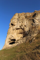 A rock formation with a hole in it