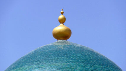 Cupola of turqouise dome with gold top
