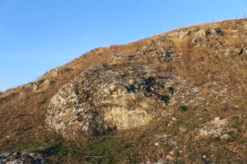 Fototapeta na wymiar A rocky hill with a dirt path