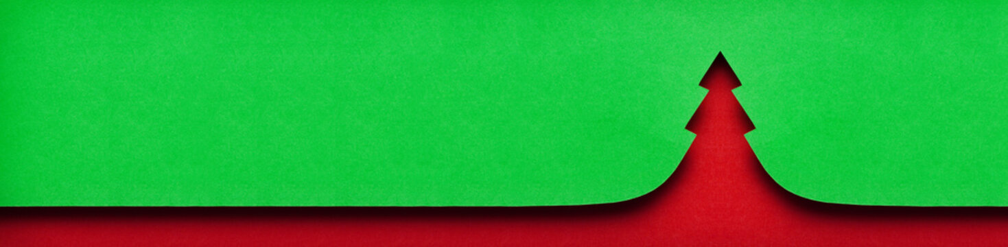 Red Christmas tree shape cut out green paper