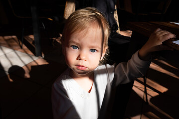 Portrait of a child in bright sunlight