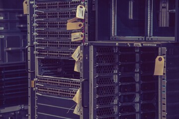 Marked and stored empty server cabinet after decommissioning 