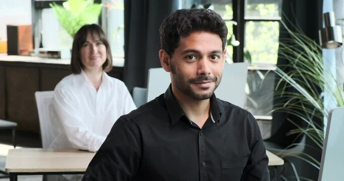 Middle Eastern employee, visibly affected, grapples with a setback in work at the office. His expression reflects the challenges and disappointments that can arise in the pursuit of business success.