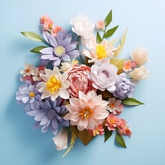 Bouquet of beautiful spring flowers on pastel blue table top view. Flat lay