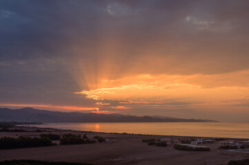 beautiful sunset against the backdrop of the sea and mountains on the island of Cyprus 1