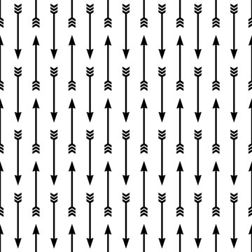 Small vertical black archery arrows isolated on a white background. Monochrome seamless pattern. Vector simple flat graphic illustration. Texture.