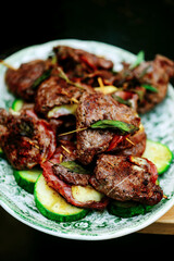 Grilled veal picatta with vegetables on the outdoor grill
