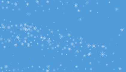 Christmas background. White delicate snowflakes on a blue background. New Year's holiday design