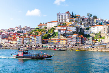Rabelo Fishing Boats with Wine Barrels,.Douro River,.Ribeira, from Vila Nova de Gaia..Porto,...