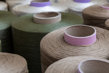 stacks of threads. a beautiful composition created from a set of colorful threads in skeins