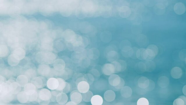 Turquoise Ocean Boiling With Foamy Waves. Sea Waves Crashing. Bokeh. Blur.