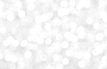 White and gray bokeh background. Photo can be used for the concepts of New Year, Christmas, Wedding...