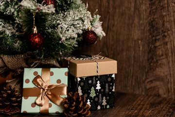 Fototapeta na wymiar Christmas tree with gifts. Christmas decor. Gifts are under the Christmas tree
