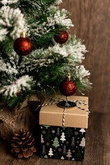 Naklejka na ściany i meble Christmas tree with gifts. Christmas decor. Gifts are under the Christmas tree