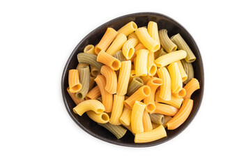 Rigatoni colored raw pasta in bowl isolated on white. Top view.