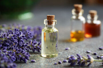 Obraz na płótnie Canvas A bottle of lavender essential oil