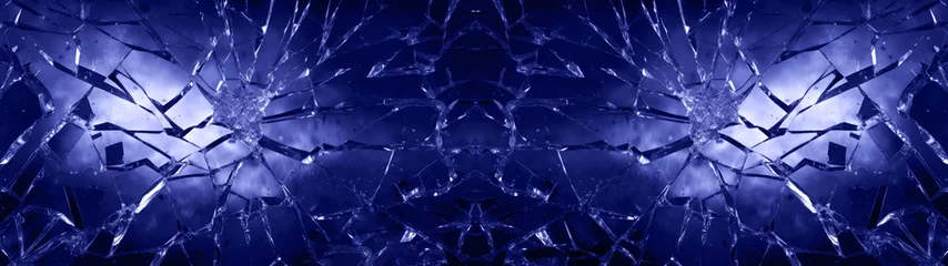 Fotobehang Cracked glas, shards of broken glas on blue background, abstract texture design  © Gertrud