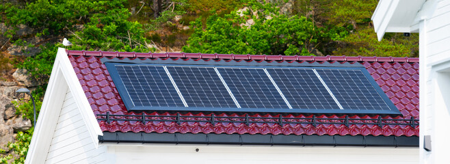 Solar panels on a garage roof.