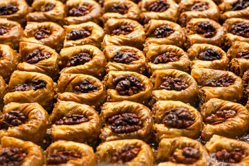 Turkish sweet baklava on tray. Traditional Baklava from Gaziantep, Turkey. Baklava with walnut.