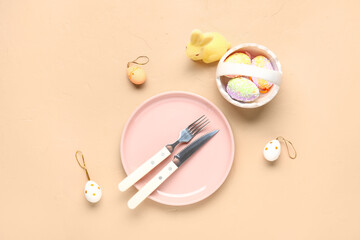 Beautiful table setting with Easter decor on color background