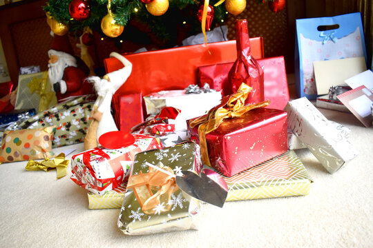 Multi Presents and gift boxes under the Christmas tree during the Christmas holiday.