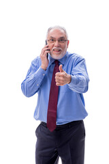 Old businessman talking by phone isolated on white