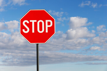 Stop sign. Traffic sign. STOP sign on pole near the road