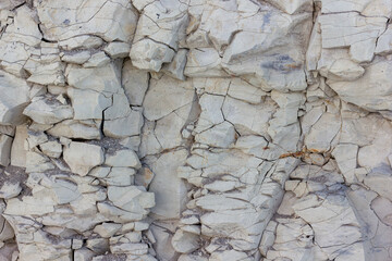 scree from the mountain on the shore stones from opoka, close-up texture
