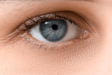 Woman with grey eyes, closeup