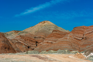 Obraz premium Nallihan District in Ankara, Turkey. The Girl Hill Natural Monument (Rainbow Hills) the geological structure with its colorful rainbow tones. Nallihan Bird Sanctuary.