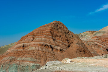 Fototapeta premium Nallihan District in Ankara, Turkey. The Girl Hill Natural Monument (Rainbow Hills) the geological structure with its colorful rainbow tones. Nallihan Bird Sanctuary.