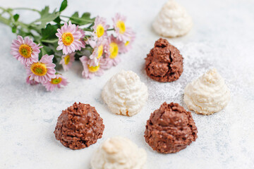 Delicious homemade meringue cookies with coconut flakes.
