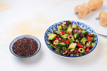Quinoa salad with olives,avocado,cherry tomatoes,onion,green.