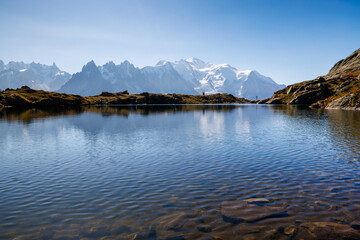 mountain lake Lac Blanc in Chamonix with mountains of the Mont Blanc Massiv in the distance