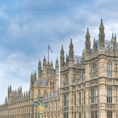 Houses of Parliament in London as seen from main street near Cromwell Green - obrazy, fototapety, plakaty