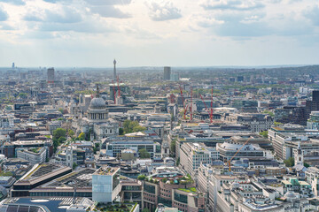Obraz na płótnie Canvas Aerial view of west London on a sunny day, classic St. Pauls cathedral amongst many modern buildings