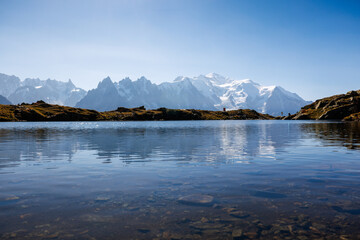 mountain lake Lac Blanc in Chamonix with mountains of the Mont Blanc Massiv in the distance