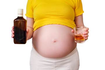 A bottle of whiskey and a glass in the hands of a pregnant woman, isolated on a white background