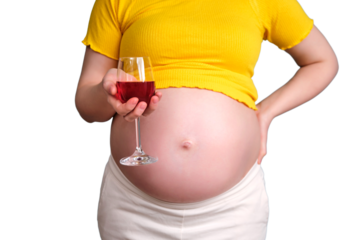 A glass of red wine in the hands of a pregnant woman, isolated on a white background