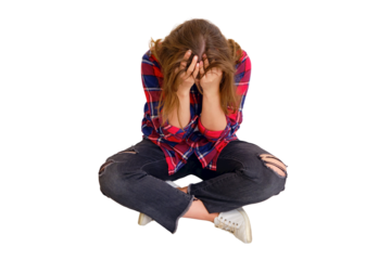A woman cries because of the complexity and problems with the repair of the apartment with her own hands, isolated on a white background. Laid out construction tools on the floor