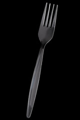 Fork stainless steel isolated on black background